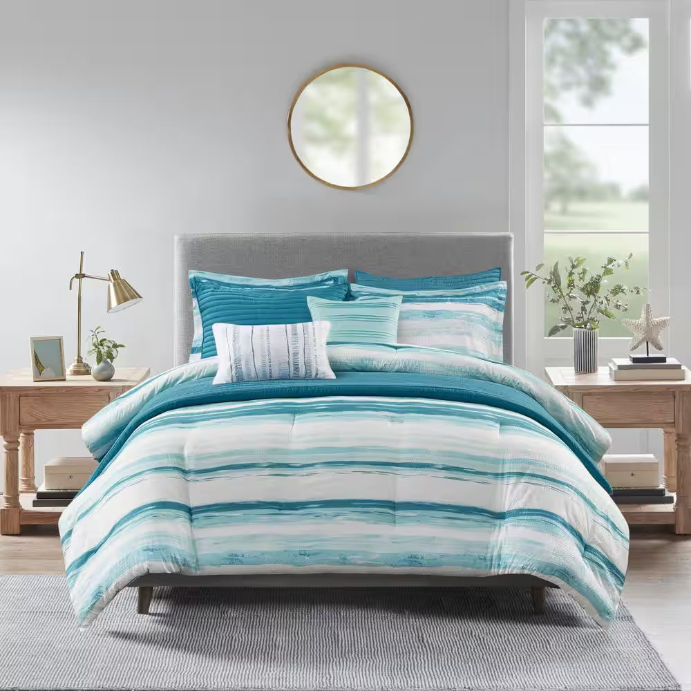 Marina Azure Coastal Comforter Set - Aqua and teal seersucker striped bedding on styled bed