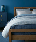 Fern Percale Duvet Cover in Denim Blue – Lifestyle bedroom setting | Casa Marella