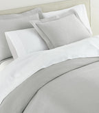 Montauk Matelassé Sham lifestyle alt view in Gray – luxury bedding – Peacock Alley