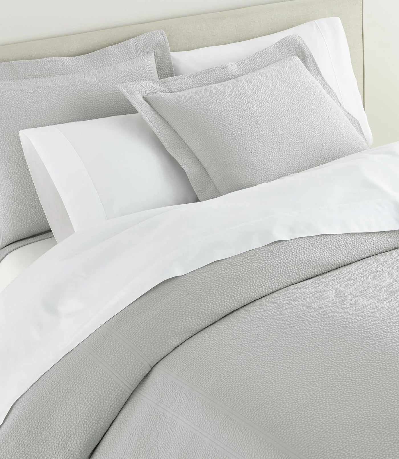 Montauk Matelassé Sham lifestyle alt view in Gray – luxury bedding – Peacock Alley