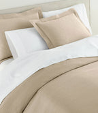 Montauk Matelassé Sham lifestyle alt view in Linen – woven in Portugal – Peacock Alley