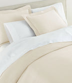 Montauk Matelassé Sham lifestyle view in Pearl – 2.5" flange – Peacock Alley Casa Marella