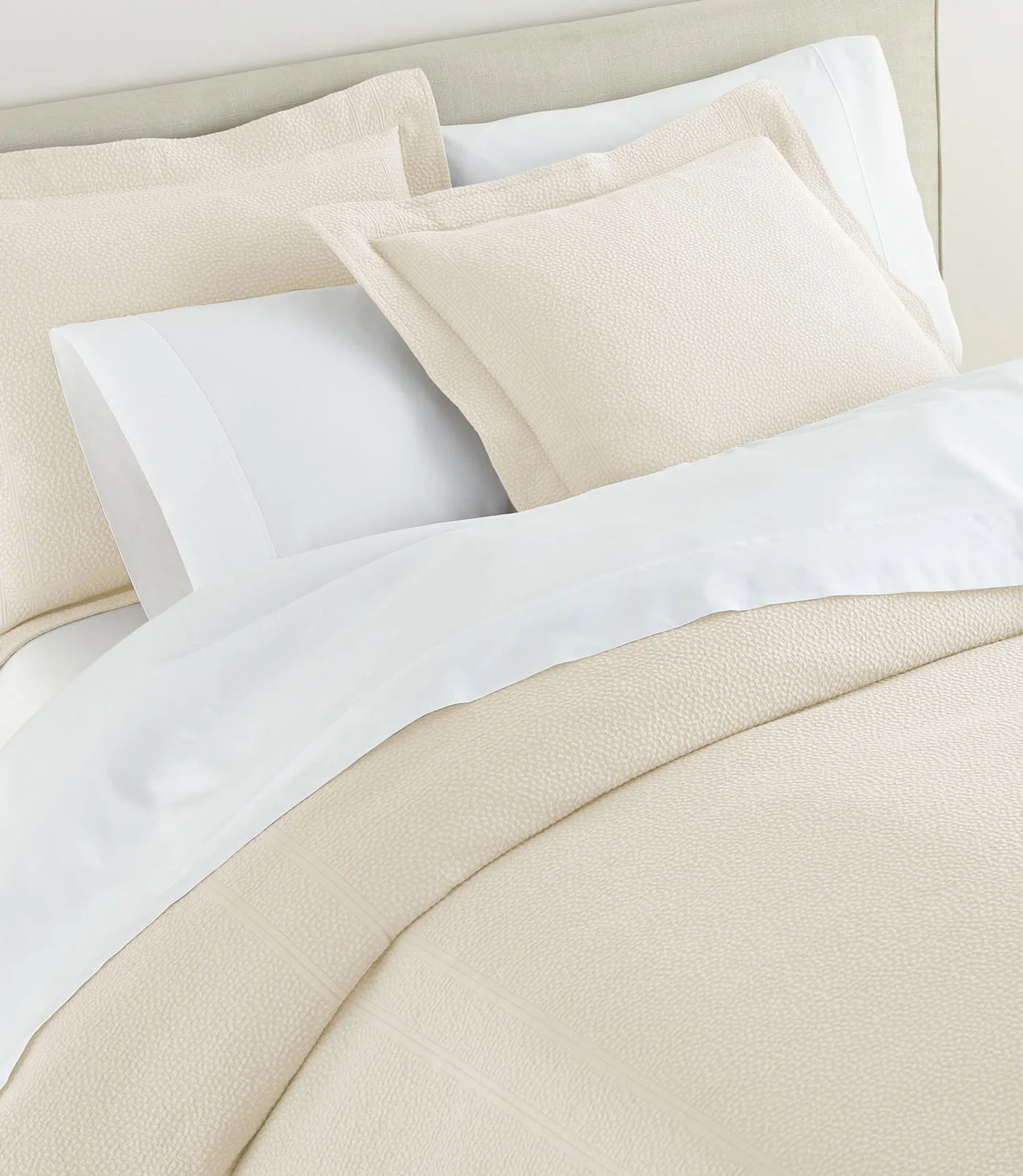 Montauk Matelassé Sham lifestyle view in Pearl – 2.5" flange – Peacock Alley Casa Marella