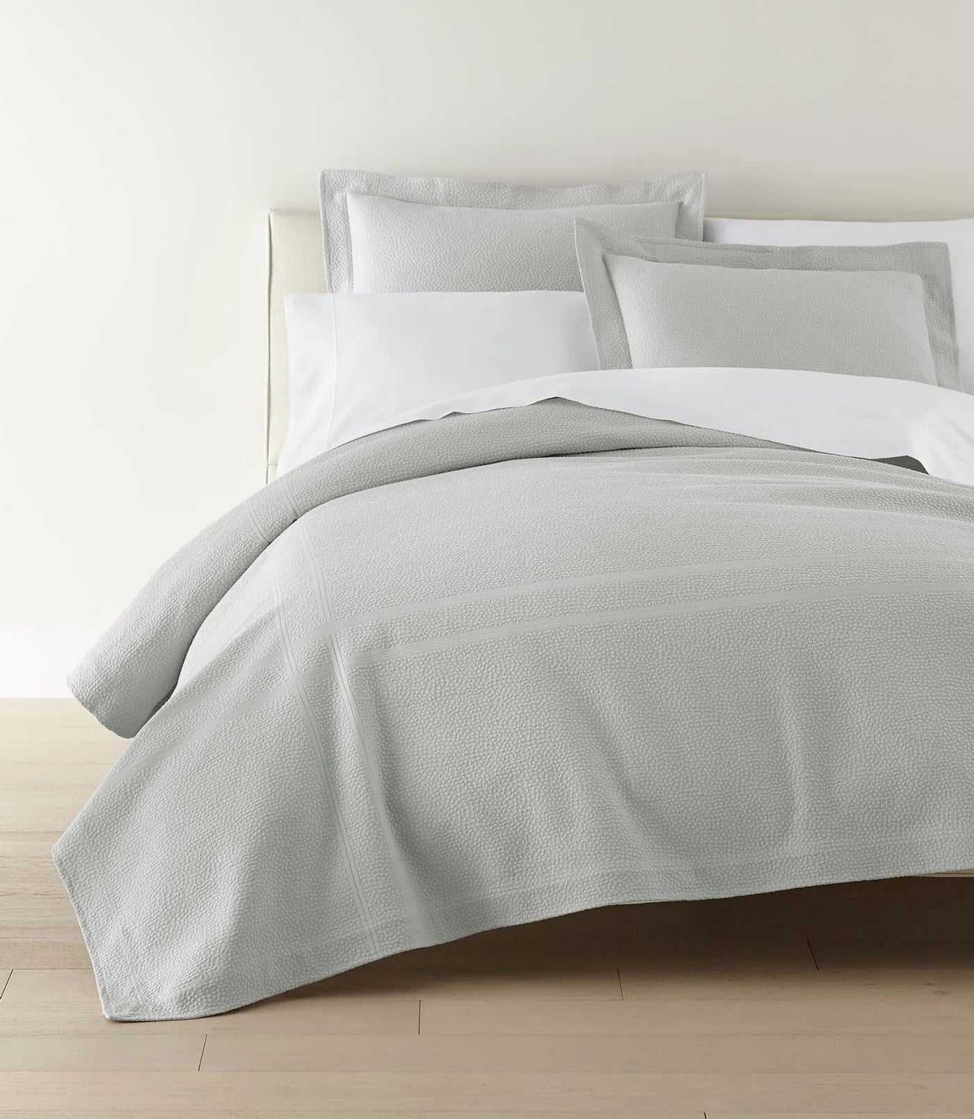 Montauk Matelassé Coverlet lifestyle foot view in Gray – luxury bedding – Casa Marella