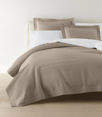 Montauk Matelassé Coverlet lifestyle foot view in Platinum – bedroom styling – Casa Marella