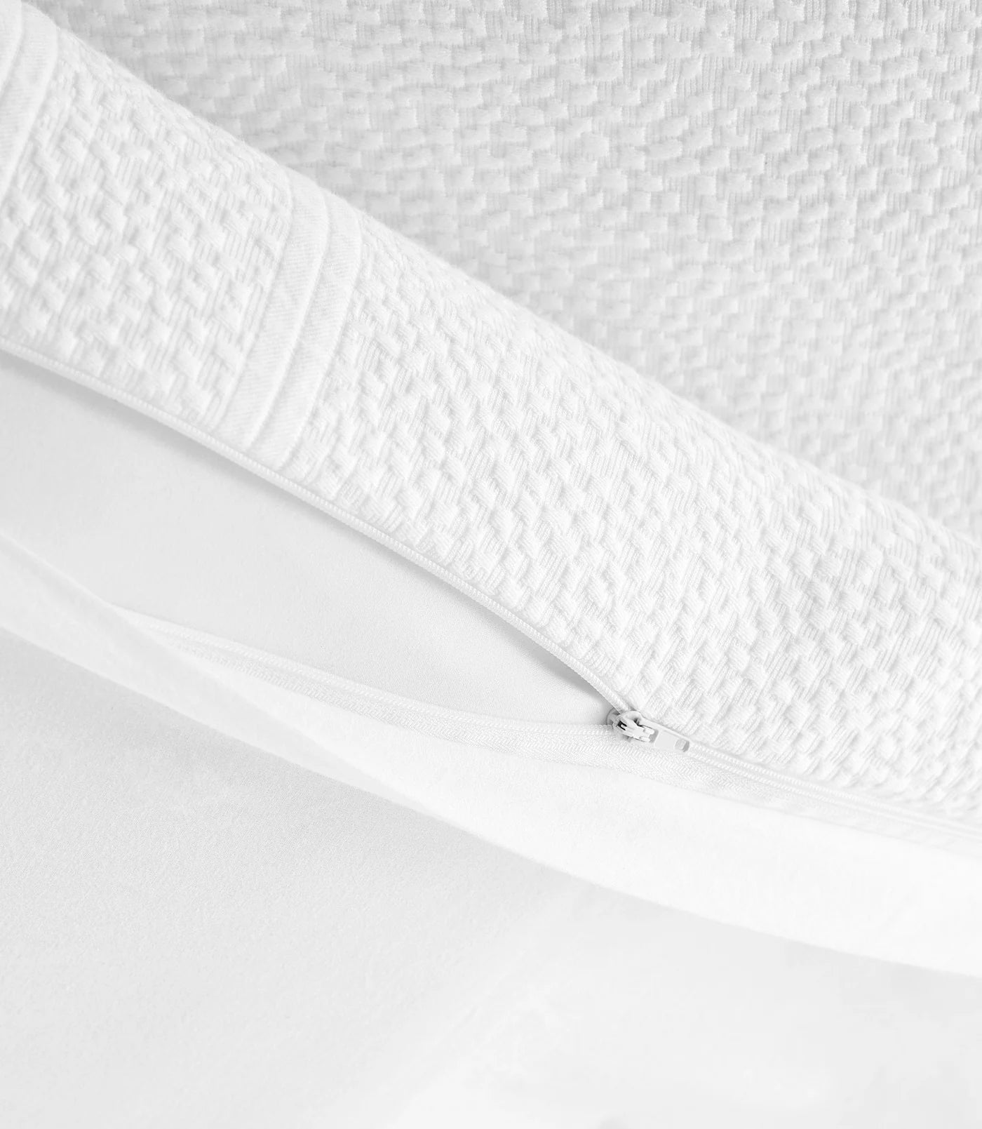 Montauk Matelassé Duvet Cover pebble texture detail – woven in Portugal – Peacock Alley
